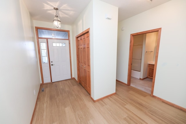 foyer with light hardwood / wood-style flooring