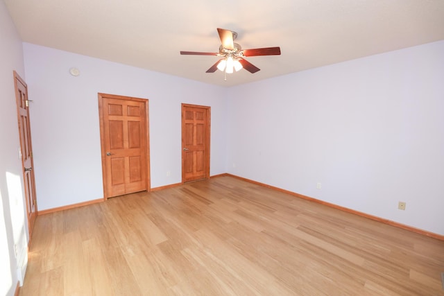 unfurnished bedroom featuring ceiling fan and light hardwood / wood-style flooring