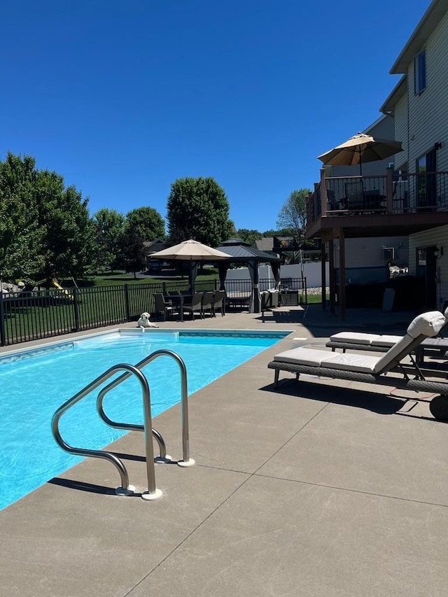 view of pool with a gazebo and a patio area