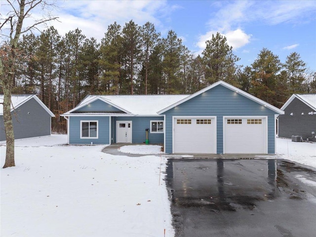 ranch-style home with a garage