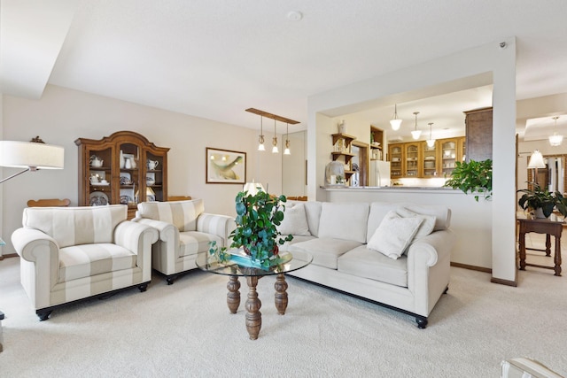 living room with light colored carpet