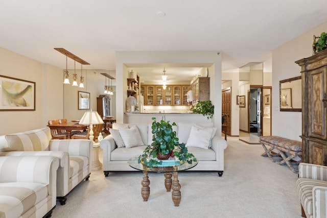 living room featuring light colored carpet