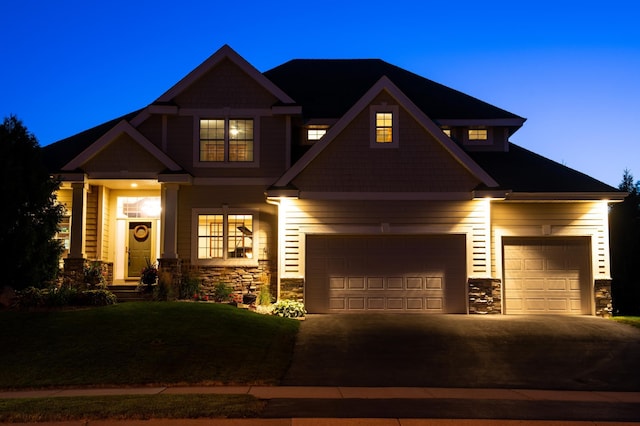 craftsman inspired home featuring a garage