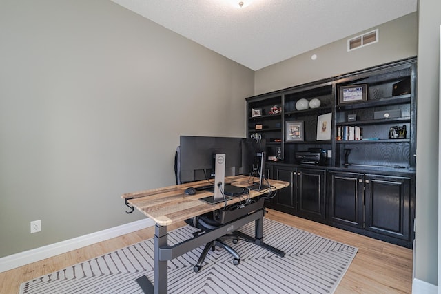 office featuring light hardwood / wood-style floors