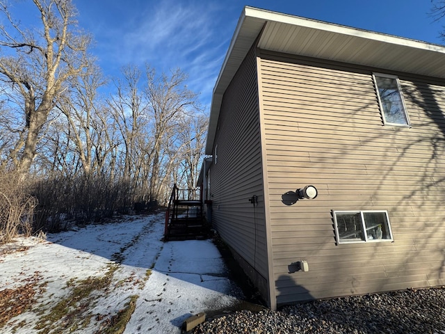 view of snow covered property