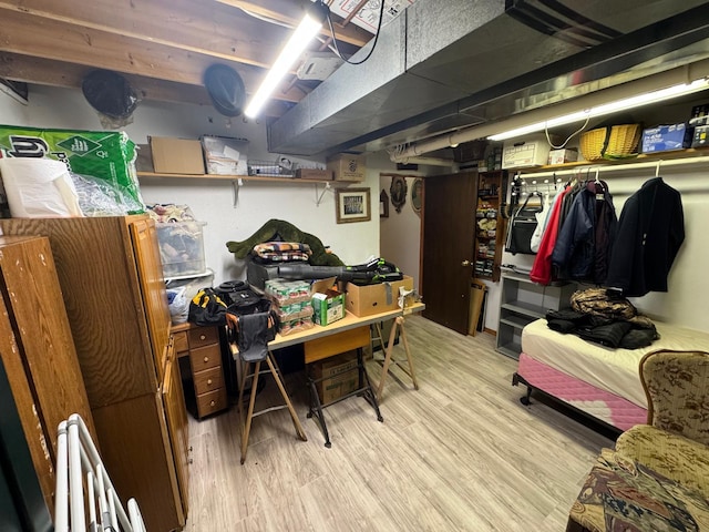 basement with light wood-type flooring