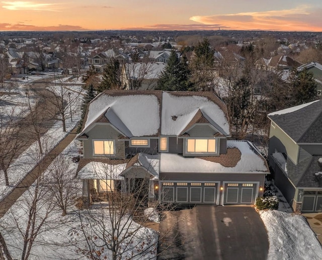 view of front of property with a garage and driveway