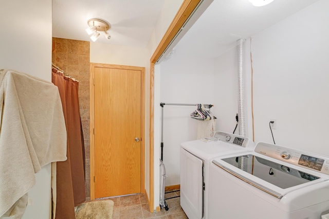 laundry area featuring washing machine and dryer