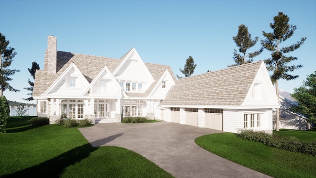 view of front of property featuring french doors, a front lawn, and a garage