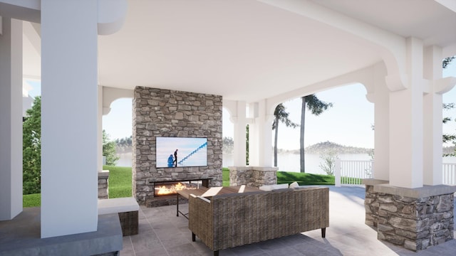 view of patio with an outdoor living space with a fireplace