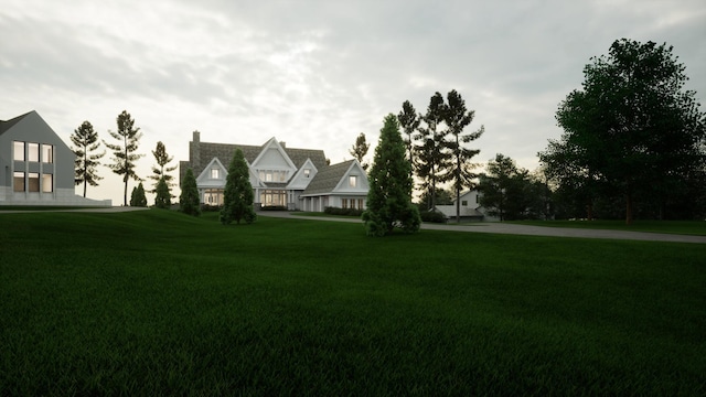 view of property's community featuring a lawn