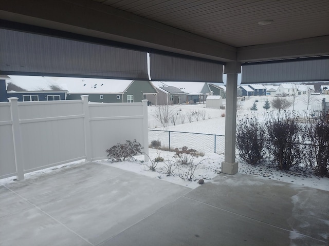 view of snow covered patio