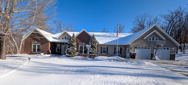 view of front of property with a garage