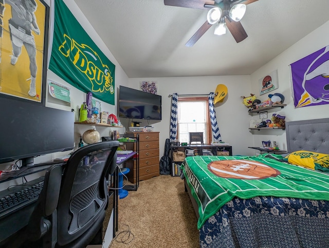 bedroom featuring ceiling fan and carpet floors