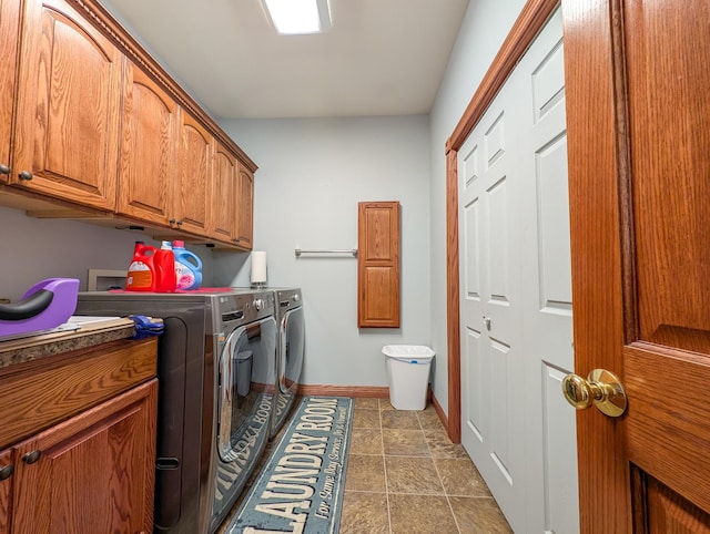 laundry area with cabinets and washer and dryer