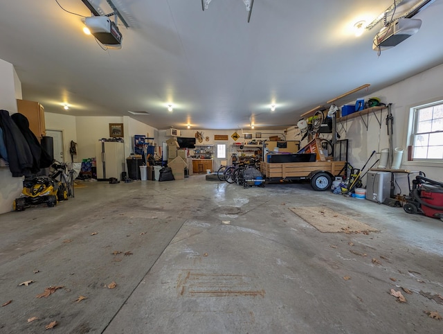 garage featuring a garage door opener