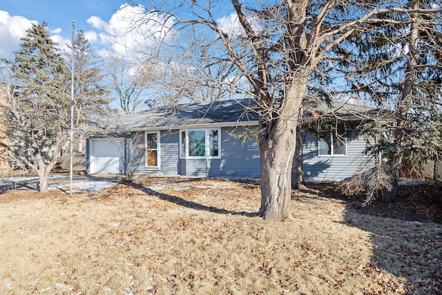 single story home with a garage