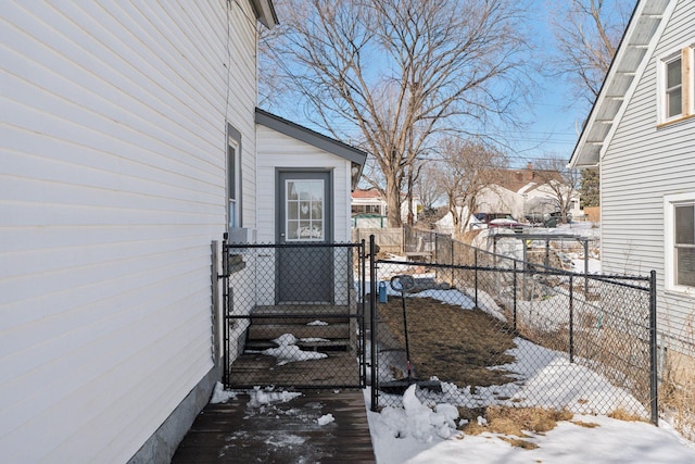 exterior space featuring fence and a gate