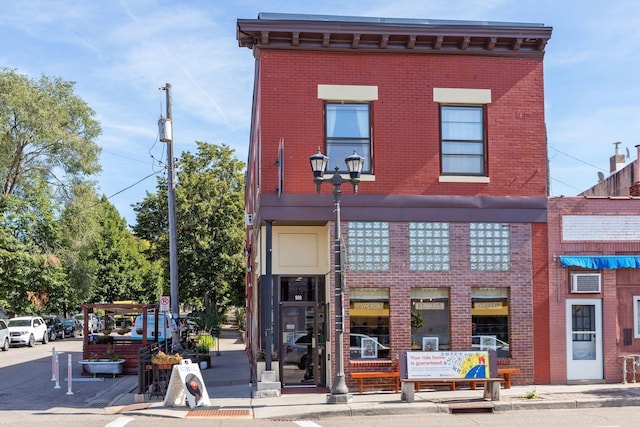 exterior space with brick siding