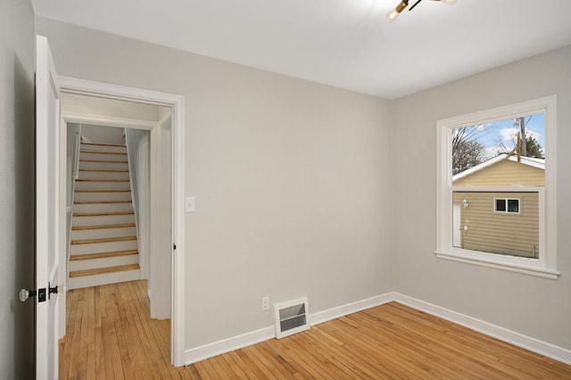 empty room featuring light hardwood / wood-style floors