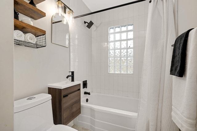 full bathroom featuring toilet, vanity, and shower / bath combo with shower curtain