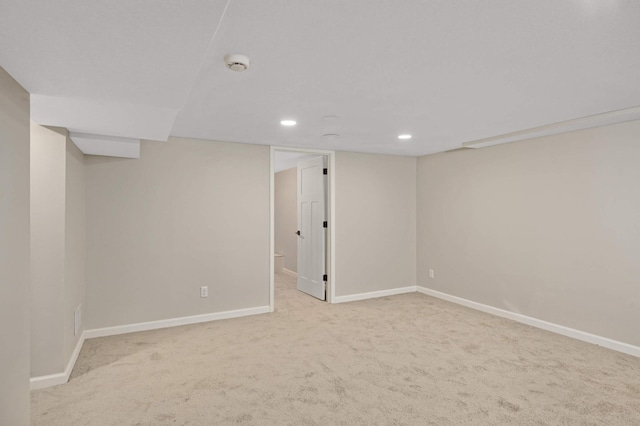 basement with light colored carpet