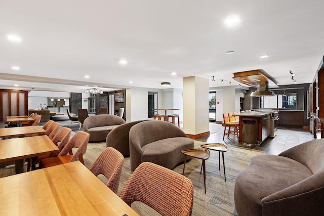 dining space featuring light tile patterned floors