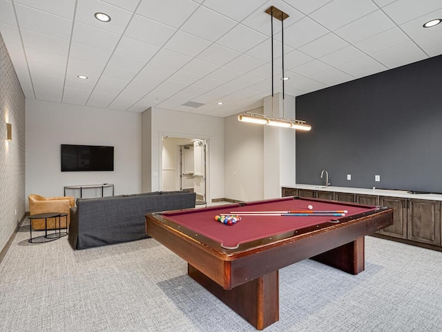 game room with light colored carpet, a drop ceiling, and billiards