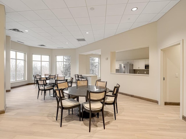 dining room featuring light hardwood / wood-style floors