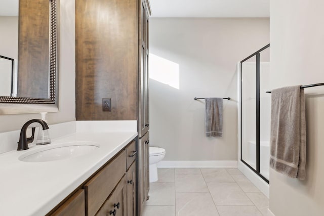 bathroom with walk in shower, vanity, toilet, and tile patterned flooring