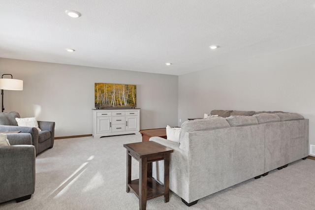 living room featuring light carpet