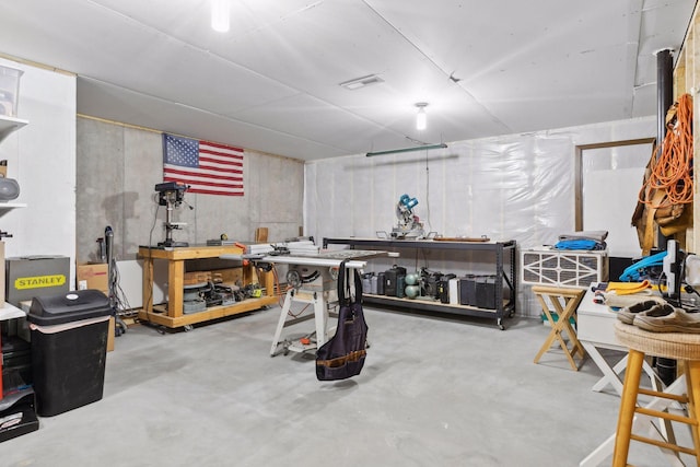 basement featuring a workshop area