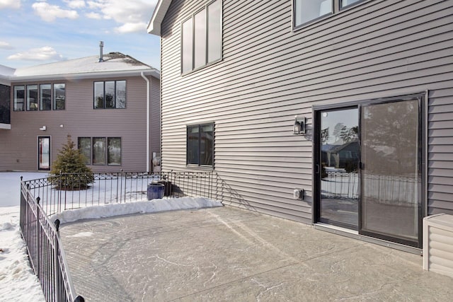 view of snow covered patio