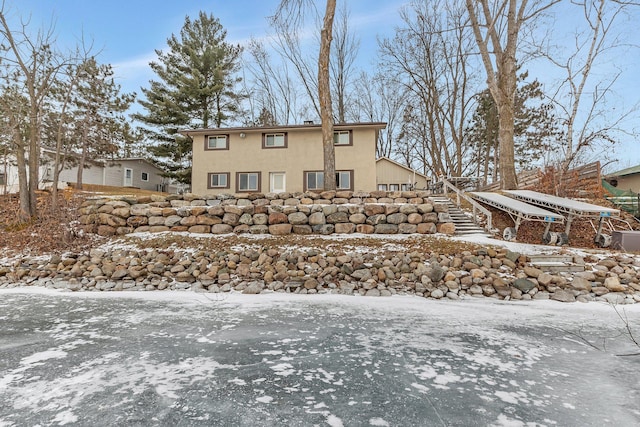 view of snow covered property