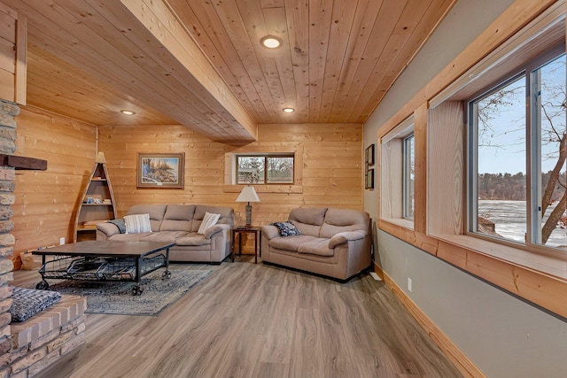 living room featuring wood ceiling, hardwood / wood-style floors, and wooden walls