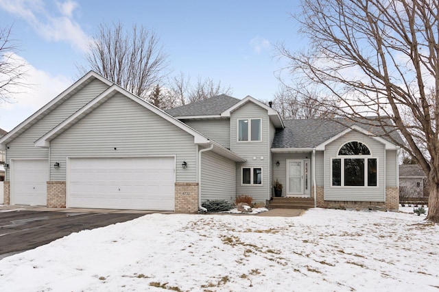 front of property with a garage