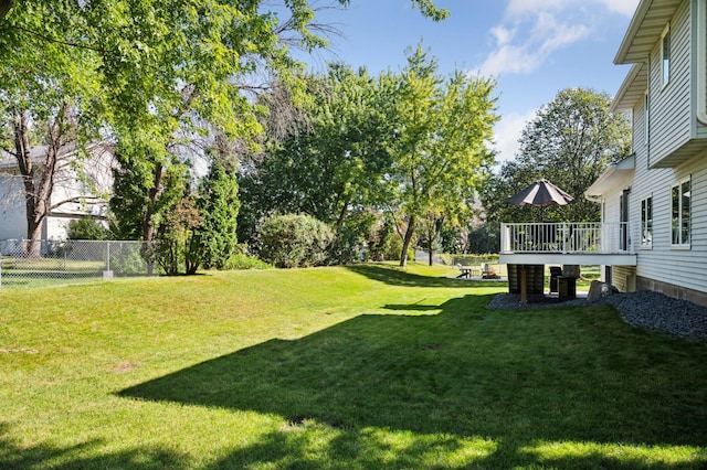 view of yard with a deck