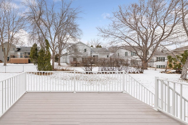 view of snow covered deck