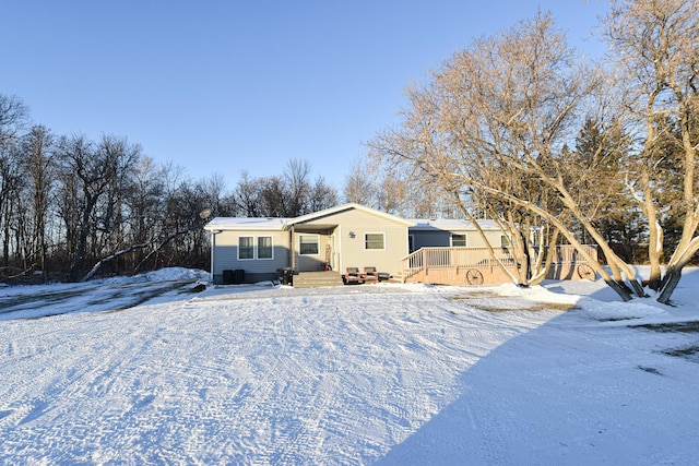 view of snow covered property