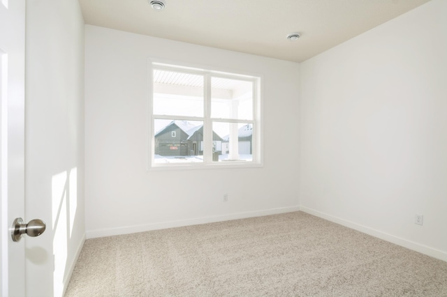 spare room with carpet flooring