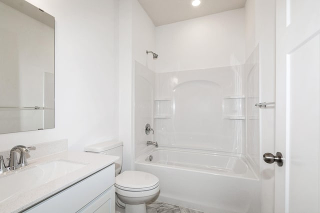 full bathroom with vanity, toilet, and washtub / shower combination