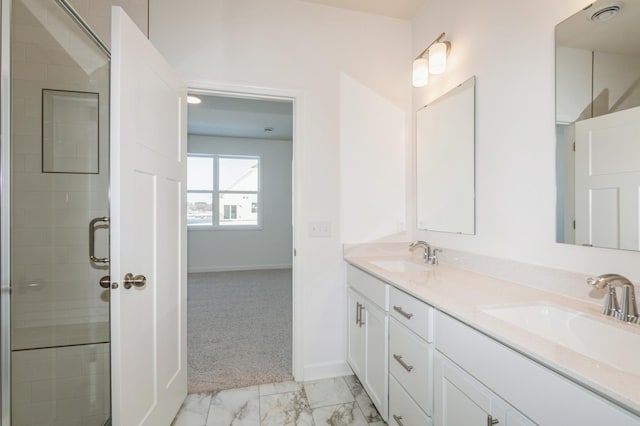 bathroom with vanity and walk in shower