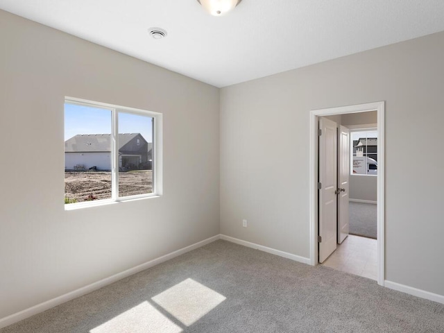 view of carpeted spare room