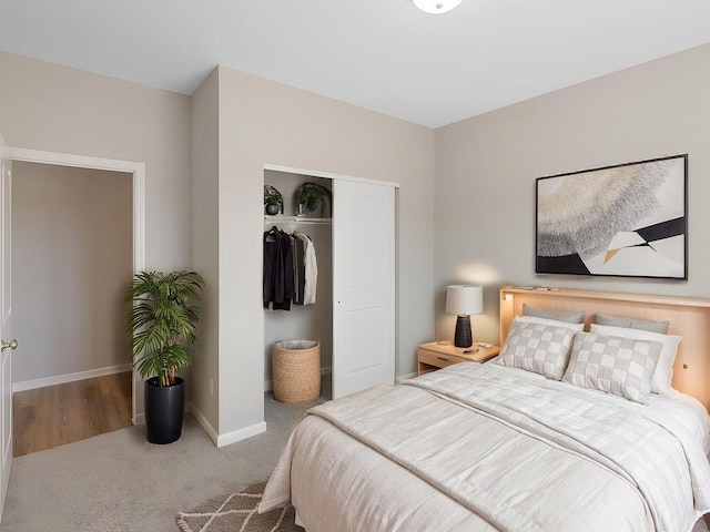 carpeted bedroom with a closet