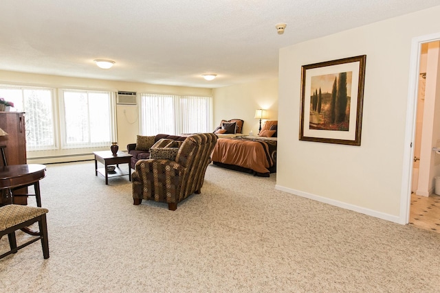 carpeted living room with a wall unit AC and a baseboard radiator