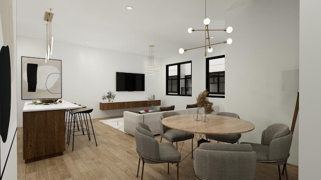 dining area featuring an inviting chandelier and light wood-type flooring