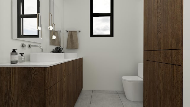 bathroom with toilet, tile patterned flooring, and vanity