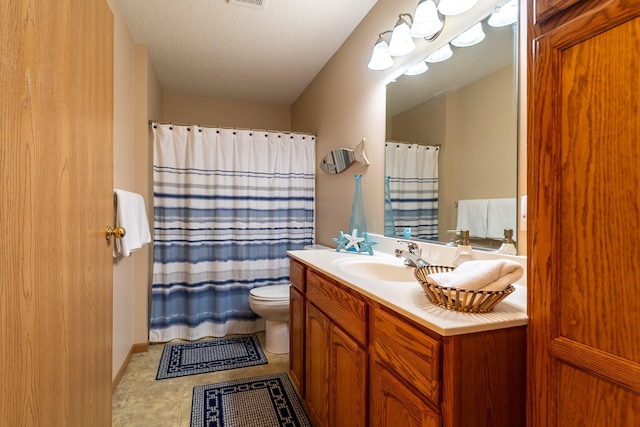 full bath featuring visible vents, toilet, tile patterned floors, curtained shower, and vanity