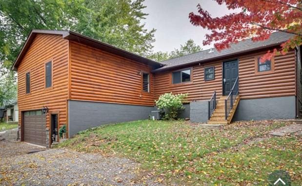 exterior space featuring driveway and a garage