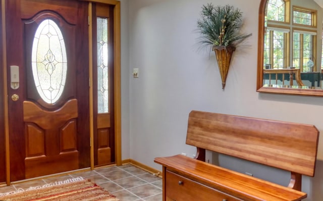 entrance foyer featuring light tile patterned flooring